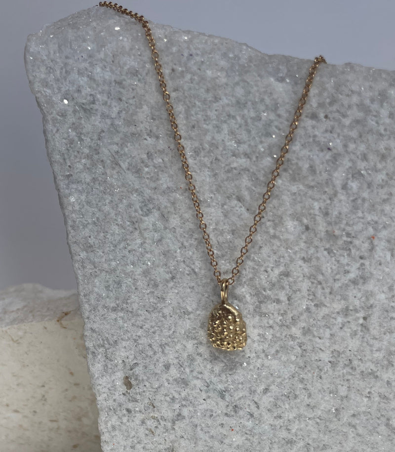 Neptune pendant, 9ct gold.