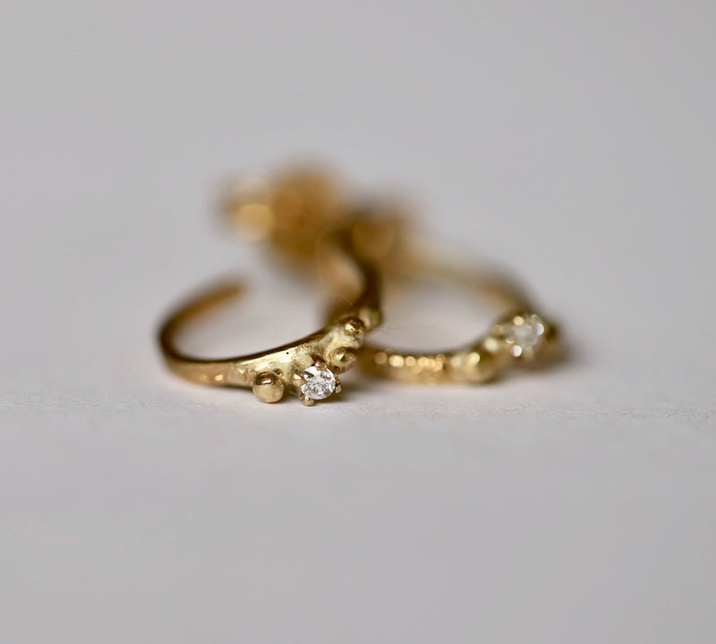 Close up view of the mini Mana hoops, showing diamond set with gold beading detail