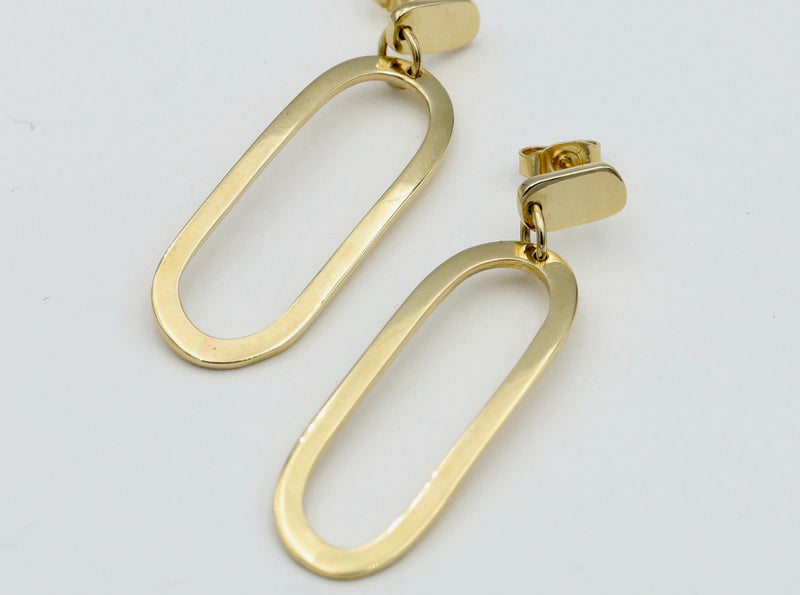 Statement earrings in gold, 70's inspired stud fixed. 