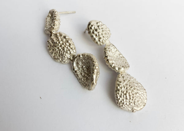 Silver earrings representative of seaweed, 40cm in length